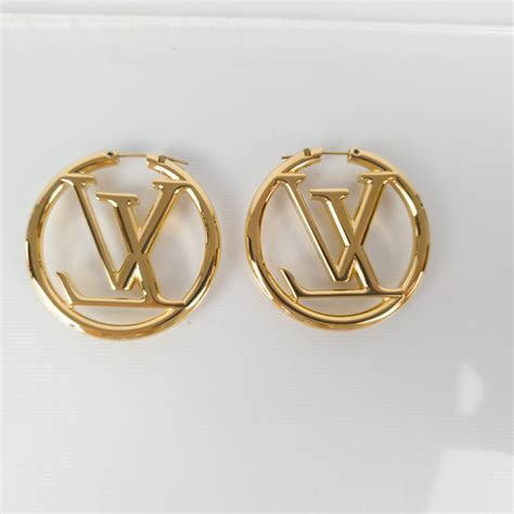 louis vuitton earrings silver hoops|Louis Vuitton nautical hoop earrings.